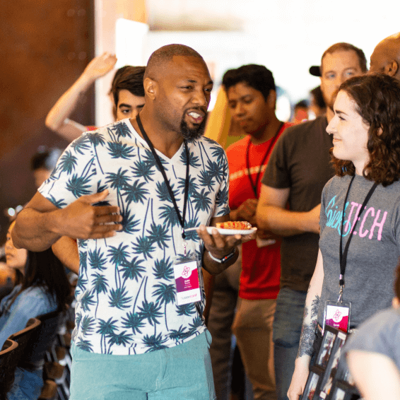 Attendees networking at FusionConf